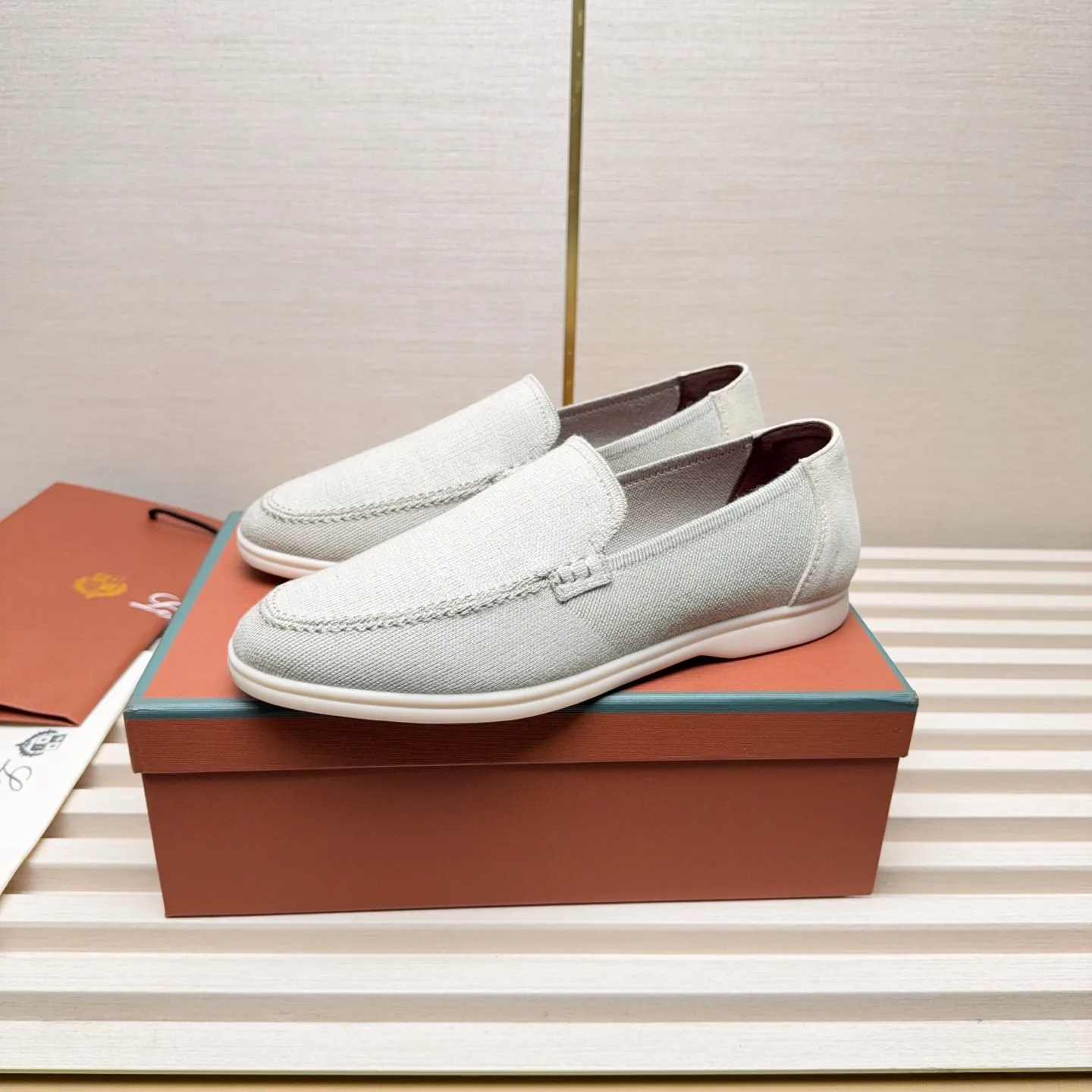 Men's Men's Shoes 💰400 Loro PIana moccasins are made of wish wool fabric. The upper is made of knitted fabric, made on a loom, and then attached to a rubber sole. The Rain System's water-repellent treatment enhances the shoe's functional design, while the suede details give the shoe a sense of elegance and sophistication. Made from Wish, fine wool from Australian and New Zealand Merino sheep